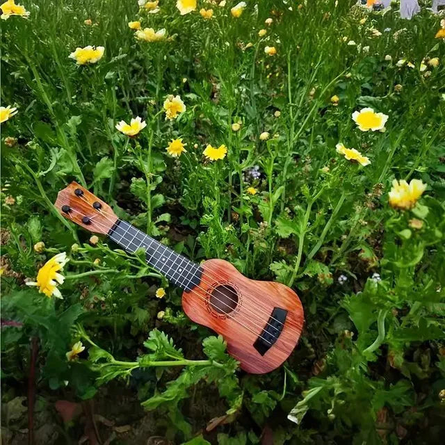 Mini Wooden Finish Plastic Guitar Music Instrument with 4 strings Clear voice